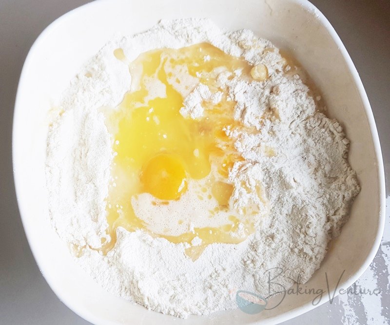 Crack and add the egg to the dry ingredients.